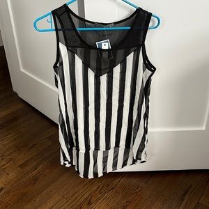 Vertical black and white striped shirt